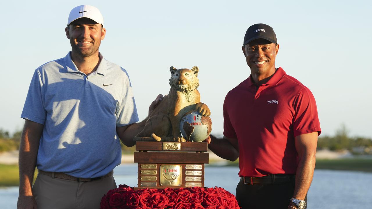 Champion Scottie Scheffler and Tiger Woods
