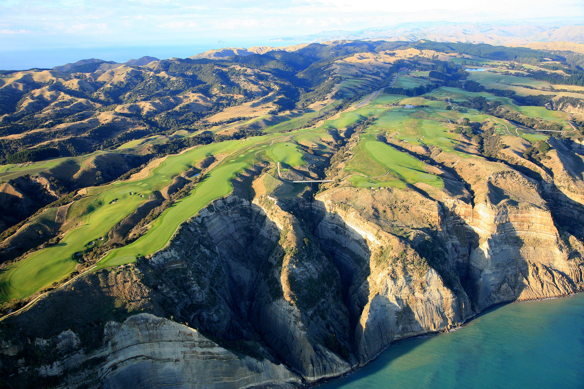 Cape Kidnappers, on the east coast of New Zealand's north island, is one of the most photographed courses in world golf. Here, holes 13 to 16 show the spectacular drop down from the course to Hawke's Bay below. Gary Lisbon