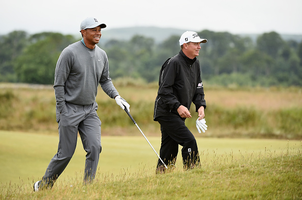 ST ANDREWS, SCOTLAND - JULY 13: (L-R) Tiger Woods of the United States and Jason Dufner of the United States walk up the fifth green ahead of the 144th Open Championship at The Old Course on July 13, 2015 in St Andrews, Scotland. (Photo by Warren Little/R&A/R&A via Getty Images)