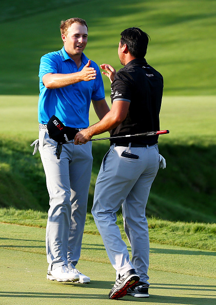 SHEBOYGAN, WI - AUGUST 16:  Jordan Spieth of the United States (L) greets Jason Day of Australia after Day's three-stroke victory at the 2015 PGA Championship at Whistling Straits on August 16, 2015 in Sheboygan, Wisconsin.  (Photo by Tom Pennington/Getty Images)