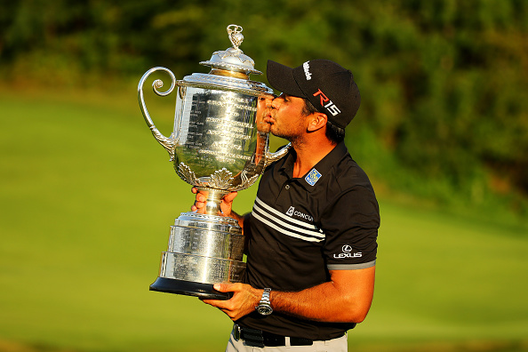 SHEBOYGAN, WI - AUGUST 16:  Jason Day of Australia kisses the Wanamaker trophy after winning the 2015 PGA Championship with a score of 20-under par at Whistling Straits on August 16, 2015 in Sheboygan, Wisconsin.  (Photo by Richard Heathcote/Getty Images)