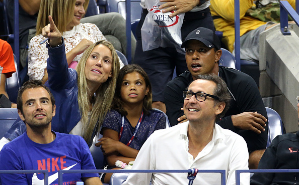 NEW YORK, NY - SEPTEMBER 4: Maria Isabel Nadal, sister of Rafael Nadal, Tiger Woods and his daughter Sam Woods attend in Rafael Nadal's box his match against Fabio Fognini of Italy on day five of the 2015 US Open at USTA Billie Jean King National Tennis Center on September 4, 2015 in the Flushing neighborhood of the Queens borough of New York City. (Photo by Jean Catuffe/GC Images)