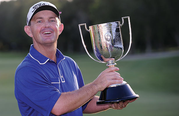 Greg Chalmers holds the Kirkwood Cup after winning the 2014 Australian PGA Championship