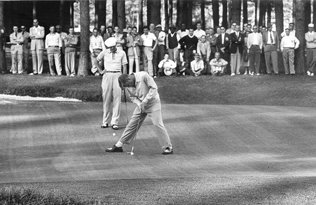 Joe Kirkwood Jr putts on the 16th green during the final round of the Masters Tournament circa, 1950