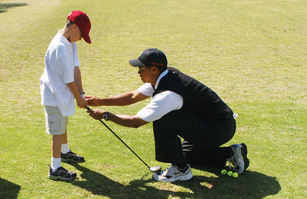 Woods passes on his knowledge of the golf swing through his charity, the Tiger Woods Foundation.