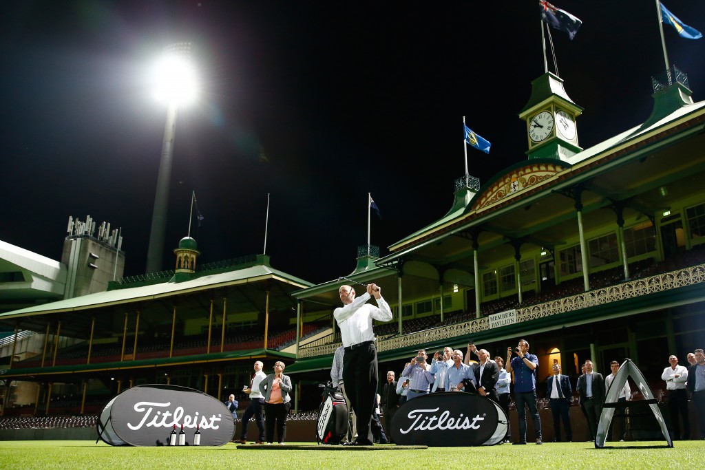 Geoff Ogilvy tees off under lights at the Sydney Cricket Ground during the Australian Golf Digest Player of the Year Awards.