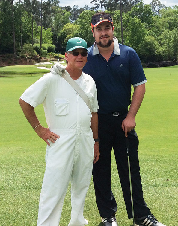 Australian Golf Digest Editor-in-Chief Brad Clifton with his caddie 'Gibby'.